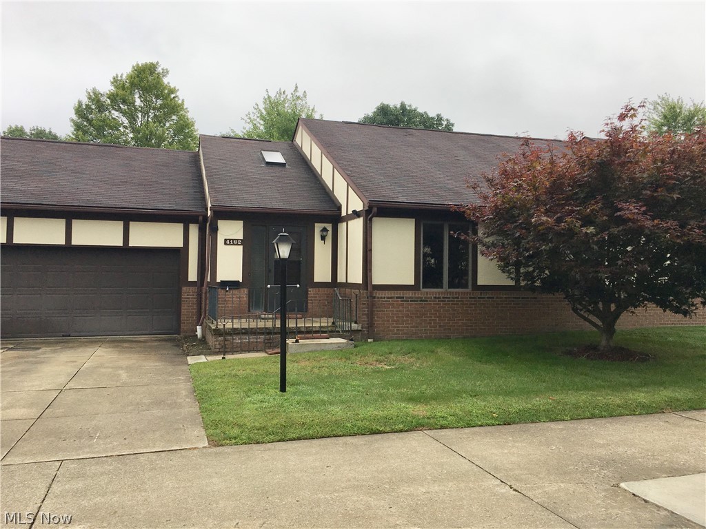 Nice opportunity to show off your rehab skills in this "rare-to-find" Ranch Style condo in Just Cricket, Brimfield Township.  Great floor plan (1936 sq ft doesn't include sun room) offers  2 large bedrooms with large closets, 2 full baths, 2 foyers, 2 car attached garage with pull-down ladder attic storage.  Quiet location convenient to great shopping and major highways.  Well managed association, private well on site.  Most appears original, furnace 2017. Monthly affordable maintenance fee of $278.42 includes recycling, trash and water, landscaping except weeding back right against your home, and snow removal. Peaceful backyard.  Administratrix has removed all personal items and carpeting.  If desired yearly swim pass $100, fishing pass $25. Application interview required and 6 months fees deposit upon ownership $1670.52  New owner pays gas, electric, cable, sewer. Easy process for court approval.