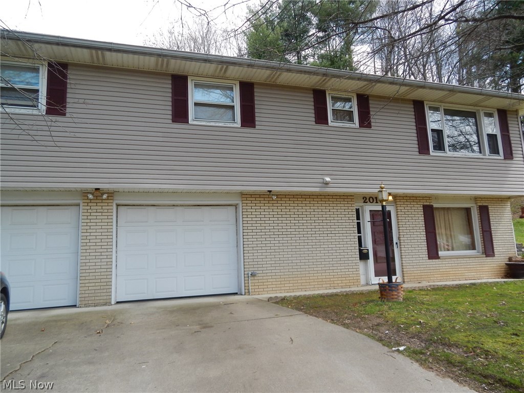 This is a wonderful raised ranch home in a great location. Features 4 large bedrooms, 2 full baths, family room w/gas fireplace, heated 2 car garage that has had B-dry, brand new hot water tank.  Located on a nicely landscaped spacious city lot. Large, private back yard backs up to the woods with a gazebo, swing and storage barn. Gas water heater, furnace and fireplace. Don't miss this opportunity!