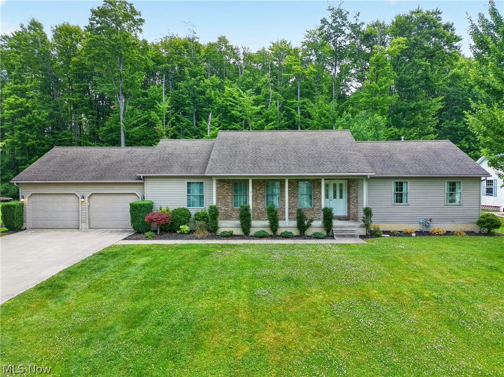Welcome home to this beautifully maintained, one-owner ranch built in 2009, ideally located at 412 Brittany Lane in Jefferson, just steps from Jefferson Area Schools. This spacious home has been lovingly cared for and is ready for its next owners to add their personal style and finishing touches.

The main level features two generously sized bedrooms, each with its own attached bathroom and walk-in closet. A flexible bonus room on the first floor offers the potential for a third main-level bedroom, home office, or den. You'll also appreciate the convenience of first-floor laundry and an additional half bath for guests.

The fully finished basement expands the living space with two additional bedrooms featuring egress windows and large closets, a full bathroom, and an expansive open recreation area that's perfect for entertaining, game nights, or gatherings.

The inviting living room is highlighted by a cozy gas fireplace, while the welcoming front porch provides the perfect place to relax and enjoy the neighborhood. Completing the home is a two-car attached garage, offering ample storage and everyday convenience.

Don't miss this exceptional opportunity to own a quality-built home in a desirable location close to schools, parks, and everyday amenities!