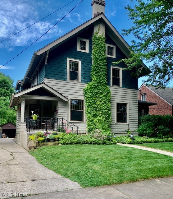 Welcome Home to this exceptional colonial on one of West Akron's finest streets! With loads of character and charm this house will not disappoint. Enter through the welcoming front porch into the beautiful foyer.  The first floor offers stunning moldings throughout with a living room, dining room, large kitchen, half bath and a solarium. The spacious and sunny living room has a wood burning fireplace and gorgeous built ins. The huge updated kitchen done in a retro style with newer LVT floors, a large island, stainless appliances, plus a door out to the back deck.  The gorgeous solarium with 3 walls of French windows boasts its own gas fireplace, and also leads out to the back deck.  Upstairs you will find a spacious master bedroom with an en suite bath and walk in closet!!  Down the hall are 2 additional, nicely sized sunny bedrooms and an office/possible bedroom (no closet) and a large hall bath with vintage stylings and a jacuzzi tub. On the 3rd floor you'll enjoy a 4th bedroom and g