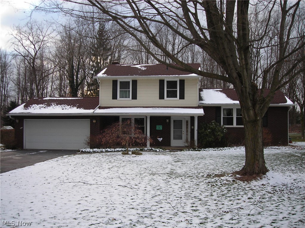 Lovely 3 bedroom 2.5 bath home in Lake Local School district located on a quiet street! Large rooms, gas fireplace and newer windows. Foyer, guest bath and front coat closet offer easy storage as you enter. Kitchen reno in 2016 offers granite counters, custom tile backsplash, stainless sink and goose neck faucet that are just what the cook ordered! Appliances to convey! Family room with sliders opens to the large covered patio and leads out onto the expansive back yard. Home office on the first floor offers a quiet work from home space! Living room and dining room boast plenty of space for Holiday gatherings! The upper level consists of a huge master bedroom with dual closets and full bath. Secondary bedrooms share a newly decorated full bath off the main hall. Large linen closets are featured in the bath and hallway. Covered front porch, rear patio and large back yard allow your outdoor entertainment!