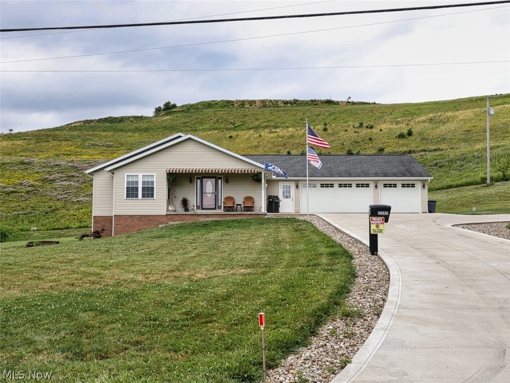 Immaculate Ranch in a Peaceful Country Setting!
Built in 2015, this beautifully maintained 3-bedroom ranch home offers easy living with an open-concept layout and stunning views from the front porch. Each bedroom features its own private full bath, plus there’s an additional full bathroom for guests.
Enjoy the convenience of first-floor laundry (washer & dryer included) and a spacious kitchen with all appliances staying. The full walk-out basement is 12-course, features a gas fireplace, large open space, utility room, and is rough-plumbed for another bath—ready for your finishing touches! The oversized 3-car garage is fully finished, insulated, and heated—perfect for hobbies or storage year-round. Exceptionally clean and well cared for—homes like this don’t come along often! All set in a beautiful country setting—don’t miss it!