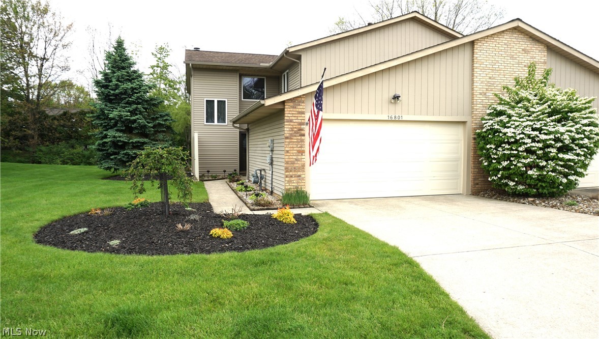 WOW! Spacious 3 Bedroom 2.5 Bath Townhouse with attached 2 car garage in Middleburg Hts!  Anderson Windows throughout! Enjoy cozy winters with a cup of cocoa in the living room with the gas fireplace, or through the dining room sliding doors enjoy a refreshing glass of ice tea in the summer on the back stamped patio with a wooded view! Granite countertops in the large eat-in kitchen with a bonus eating area off the kitchen. Owner's suite with a large private bathroom featuring a walk in shower and a jacuzzi tub! New Hot water Tank installed in April 2026! Pull down attic in garage for extra storage! One minute from 71 and only a few more minutes to plenty of shopping and restaurants! 10 minutes to airport! Home comes with 1 yr Cinch Home Warranty!