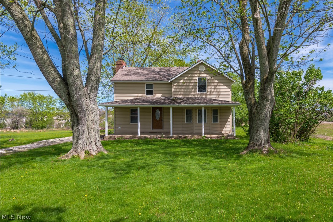 Nestled on 3.5 serene acres in the heart of Hinckley, this beautifully revitalized 3 bedroom, 2 + 1/2 bath farmhouse seamlessly blends timeless character with modern sophistication. The interior shines with fresh, neutral tones, rich natural woodwork, and durable new LVP flooring, anchored by a cozy living room featuring custom built-ins and a warm fireplace. Culinary enthusiasts will appreciate the expansive kitchen, which is outfitted with granite style countertops, recessed lighting and ceramic tile, while the formal dining room provides an elegant space for hosting. Recent high-value infrastructure improvements offer total peace of mind, including Anderson windows (2020), a new hot water tank (2025), updated siding, and modernized electrical and plumbing systems. Outside, the property is a true retreat, boasting a relaxing composite deck, a classic covered front porch, and a substantial barn equipped with a mechanic’s pit and a solid foundation perfect for a Barn 
Reconstruction. City water and sewer! This move-in-ready gem offers the ultimate country lifestyle with all the contemporary comforts of a brand-new home.