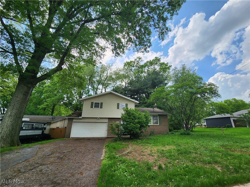 Amazing 4 BR 2.5 bath split level with attached 2 car garage on a beautiful street! Look out into the huge fenced in back yard from your deck off the newly updated sunroom. Enjoy summer dinners outdoors on the stone patio. Entertain guests in the large living room next to the beautiful sprawling eat-in kitchen equipped with all stainless steel appliances. Watch the game or set up a play area in the rec room adjoined by a half bath with new toilet. Washer, dryer, and stationary tub included for your convenience in separate laundry room. Primary BR has attached full bath.

Rental Qualification Checklist: 
-Credit score: 600+ & No recent bankruptcy. 
-No eviction history & no criminal history (involving sex, drugs or violence) 
-Monthly gross income must be at least 2.5 X Monthly Rent 
-First months rent, security deposit, renters insurance, and transferred utilities required prior to move in. 
-If you wish to apply there is a $50 app fee per adult occupant, all adult applicants must apply.