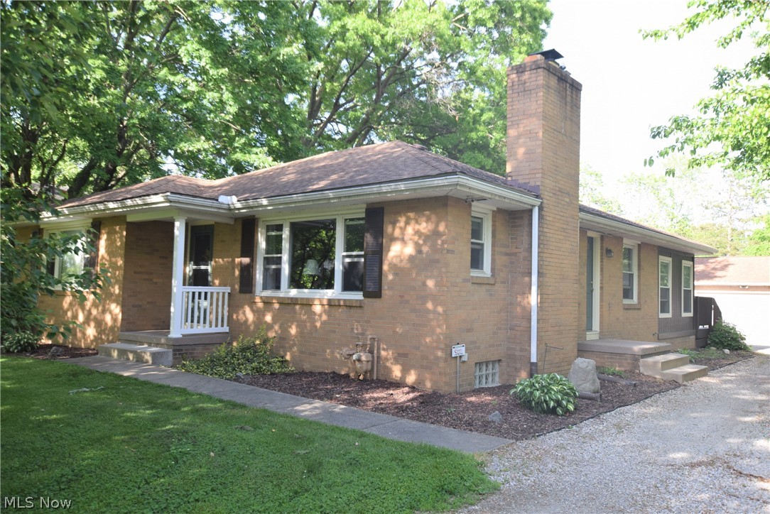 Welcome to 502 Jackson Ave.  This LARGE 2 bedroom brick ranch home has so much to offer.  With over 1300 square feet of first floor living there is room to spread out.  Current owners have put love into this home for many many years and it truly shows both inside and outside.  Numerous updates throughout including Kitchen, Bathroom, Windows, Flooring, and the 30x40 block garage.  The 4 seasons room at the rear of the home adds even more living space to the home.  Yes it does have heat & A/C.  All appliances stay in the kitchen so this really is a move in ready home. First floor bath offers a beautiful tiled shower plus a separate tub. The 30x40 block garage can easily park 3 cars maybe even 4.  It also has heat/water and a bathroom. Laundry is located in basement along with another finished room that could be used as a 3rd bedroom/office space. The basement is also plumbed to add another bathroom.  This home also sits on over a half acre lot so there is plenty of room to roam outside a