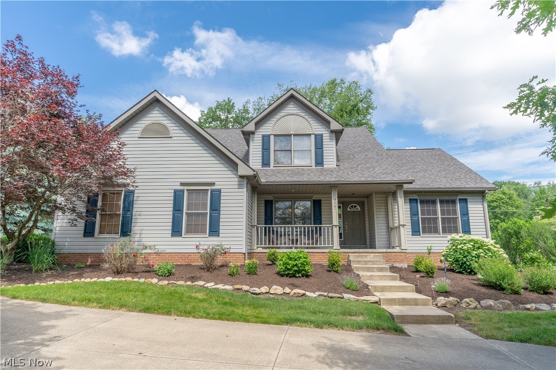 Wonderful home on gorgeous & private treed lot. First floor w/ spacious,open floor plan. Two story Great Room with 17' ceilings & gas fireplace; opens to eat-in kitchen w/stainless appliances (refrigerator 2018/dishwasher 2020). First floor laundry off kitchen (washer/dryer 2018) leads to side load two car garage. Dining room off foyer w/trayed ceiling & new light fixture. First floor master suite features private bath w/dual sinks (granite counters), & walk in closet. Second floor w/two bedrooms & full bath. Lower level 29x28 recreation room w/new Lifetime vinyl wood look flooring (2018). Gorgeous rear yard surrounded by trees w/park like setting boasts newly stained rear deck, fire pit, & brick patio. Wrap around driveway. Special features & updates: freshly painted interior rooms (2018), smart thermostat (2018), new floor to cathedral ceiling stone fireplace/Great Room (2018), linen closet added/ master bath (2018), french doors from kitchen to deck w/built in blinds (2019), Lennox