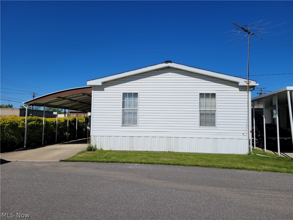 Located in Parma Estates, this home was built in 2001 and has been very well maintained. It has two large bedrooms with the larger one having a walk in closet. There is a laundry room with a washer and dryer. Outside you will find a car port and a large shed. Most of the furniture is staying with the home. If it is not wanted, owner can remove it. TV not included. This is a 55+ community.