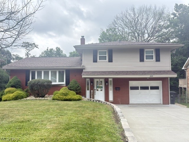 Beautifully remodeled tri-level home at the enc of a quiet cul-de-sac. Brand new cement driveway with new retaining wall. Made wide for extra parking. New Landscaping. New cement patio added in the back of home that has a brand-new hot tub. this patio has shade from deck above. Upon entering the home, you will be in a nice foyer with a large closet and ceramic tile. A 1/2 bath, garage that has nice work bench and storage. Also, a room perfect for home office or gym. New Pergo (Heirloom Estate Oak) flooring. From foyer, you can go up to 2nd level. Housing the large kitchen, dining room and living room. All new flooring here too. Brand new appliances include a stove, microwave, garbage disposal, dishwasher and a smart refrigerator. Glass sliding door in dining room takes you out to a huge deck. 3rd floor has new flooring on steps and hall. 3 nice size bedrooms with hardwood floors and full bath. Master bedroom has smart blinds. From main level you can go downstairs to laundry, furnace room, storage room with built in shelving to hold all your totes and rec room. There is also an access door to get into the crawl space.