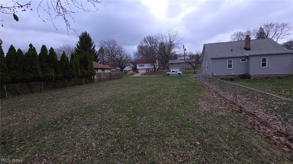 Vacant residential lot located on a quiet street in Garfield Heights. This spacious parcel offers a great opportunity for new construction or long-term investment. The lot features mature trees and established neighboring homes, providing a private and natural setting. Utilities are available at the street, making this an ideal build site for a single-family home. Conveniently located near local schools, parks, shopping, and major highways for easy access throughout the Cleveland area. Don’t miss this opportunity to build in an established neighborhood.