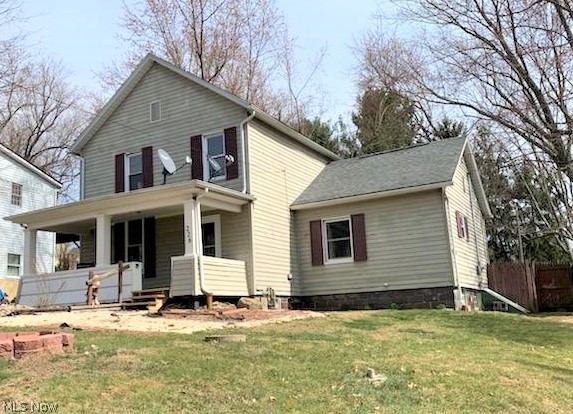 Absolutely nothing to do here but move in! Beautiful kitchen with stainless steel appliances, generously sized and updated rooms, decorative fireplace and wood columns dividing the dining room and the office, covered front porch for your evening relaxing and rear deck overlooking a large and level fenced backyard. Electrical box, gas furnace and water heater 2015. Union Local School District.