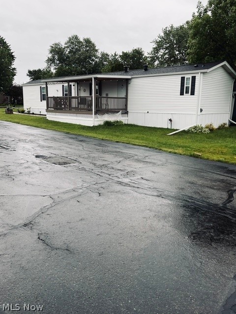Are you looking to settle into a 55+ community with very little upkeep to do? Green Acres is a small mobile home community located minutes from Ashland. This 1993 mobile home is completely move-in ready, and has been well-maintained. 3 bedrooms, and 2 full baths offer from the living area. the kitchen features a very workable lay-out and the living area provides plenty of room to spend time relaxing. A large front porch faces the street and is a perfect spot to  enjoy warm days and cool evenings. The back deck offers a spot for your morning coffee. Along with a carport and storage shed, this home has the features that will allow you to relax and enjoy life. Call your agent today to schedule a private showing.