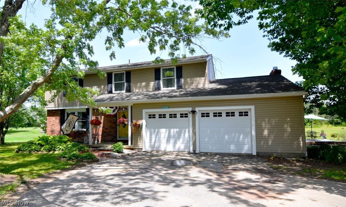 Welcome to this spacious and beautifully updated 2,888 sq. ft. home, designed for both comfortable living and effortless entertaining. The stunning great room addition is truly the heart of the home, offering an expansive space where everyone can gather and relax.

This home features five bedrooms, including two private primary suites—one on the main level and one upstairs—each with its own full bath, making it perfect for multi-generational living or hosting guests. In total, you’ll find three full baths and one half bath.

The first floor offers a semi-private den, ideal for a home office or quiet retreat, along with a convenient main-level laundry room. The bright and inviting kitchen showcases granite countertops, abundant cabinetry, and charming open shelving. It flows seamlessly into the dining room with a cozy fireplace and continues into the impressive great room.

Step outside to enjoy the tiered wood deck overlooking a heated above-ground pool and a large, private backyard with mature trees—perfect for entertaining or simply unwinding.

Recent updates provide peace of mind, including roof, siding, and gutters (2018), Kinetic water system (2019), pressure tank (2020), air iron injection tank (2026), and pool upgrades including a gas heater and sand filter (2025). Additional highlights include two newer sheds and a gas furnace (2010).

Conveniently located near schools, shopping, and major highways, this home truly offers space, comfort, and versatility for today’s lifestyle.