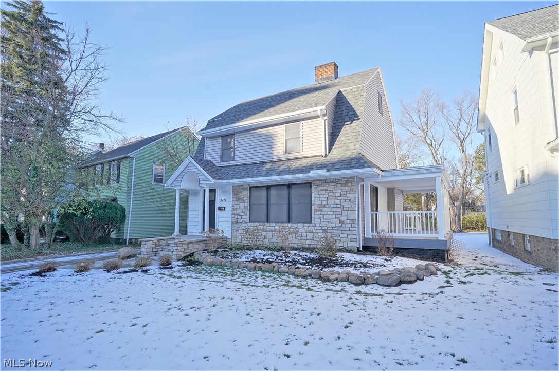 This cutting edge Home was taken down to the studs starting in 2021 and literally everything is brand new! Located in a prime location & in the heart of Cedar-Fairmount, Little Italy, University Circle and convenient to Downtown Cleveland. This lovely 2 1/2 story Colonial was reconfigured for maximum open space and features huge Living Room that easily floats Formal Dining area. Massive Stone fireplace that serves to seperate from Massive Eat-In Kitchen with Center Island, Gorgeous Granite plus a hearth feature with exotic Ceramic backsplash behind Gas stove. 1st floor laundry off kitchen. there's an open staitcase to 2nd floor & bathrooms on all finished levels. Huge loft landing on second floor walks out to balcony. Mechanical are all new, plumbing, electric, 2 heating and air conditioning systems, all new windows, new roof in 2021, vinyl siding. Brand new 1.5 car garage, all new designer lighting, LuxurVinyl flooring throughout, except bathrooms which are  also exotic ceramic tile.