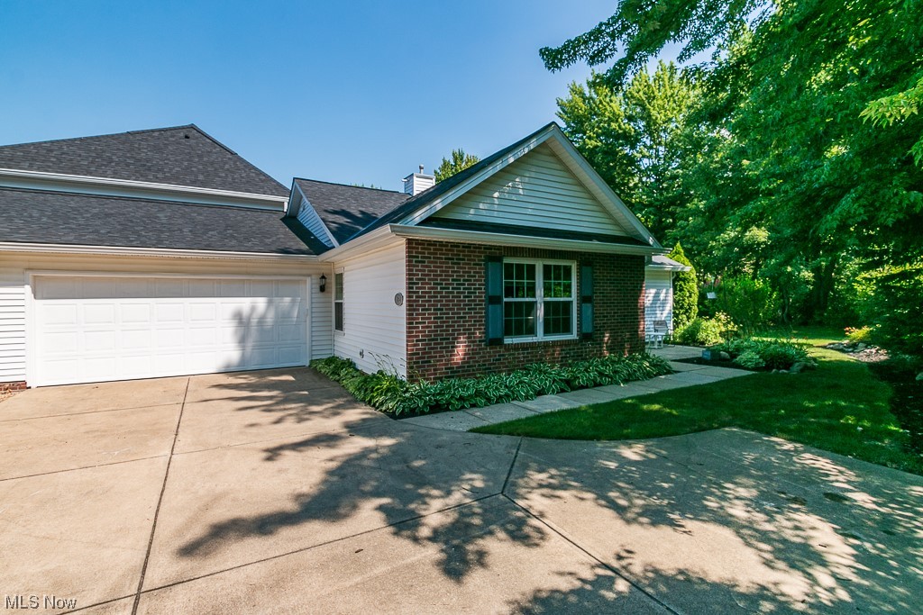 First floor living with an open floor plan!  Welcome home to this 3 bedroom, 2 full bath ranch condo in Marsh Landing! Spacious vaulted living room with plenty of natural light, offers a decorative corner gas fireplace and a slider for easy access to the outdoor patio. The kitchen with all appliances and plenty of storage, is open to the dining area and family room. The large master en-suite has a double closet and an attached full bath. There is also two additional nice-sized bedrooms, both with double closets, and another full bath. Laundry room has a large closet, shelving and utility sink. Two car attached garage with attic access. The wooded outdoor space is private with two patios. Move-in ready!