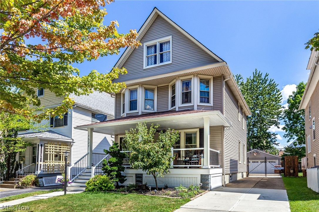 Welcome home to this fantastic Lakewood SHOW STOPPER!!!  Home welcomes you with an updated front porch complete with new spindles and Trex Decking. Walking in the front door all the wood work has been refinished including the moldings, staircase and hardwood flooring throughout the home.  Large family room with a wall of windows boasting natural light makes this the perfect room to relax. Dining room and kitchen have been completely opened up, renovated and updated to appeal to today's modern living. Kitchen features new cabinetry, subway tile backsplash, quartz counters, floating shelves, new lighting, hardwood flooring, stainless range with matching stainless hood and stainless appliances. Upstairs on the second floor are 4 well sized bedrooms, hardwood flooring and a completely updated full bathroom.  Owners suite which includes 2 separate spaces, exposed brick, exposed overhead beams and a full bathroom to provide the ultimate sanctuary escape on the third floor!  Enjoy summer even