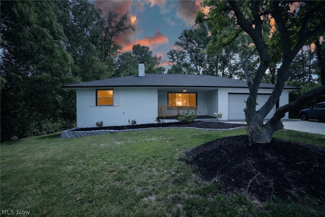 Welcome home to this beautifully updated 3-bedroom, 1.5 bath home that perfectly blends modern living with the peaceful feel of the countryside. Nestled on a spacious lot, you'll enjoy the charm of country living while still being conveniently located in the city. Step inside to find a completely renovated interior featuring a stunning brand-new kitchen with modern finishes, perfect for cooking, gathering, and entertaining. The spacious walkout basement offers endless possibilities for additional living space, while the freshly painted recreation room is ready for movie nights, game days, or a home gym. Warm up by one of the home's two cozy wood-burning fireplaces, adding character and comfort throughout the seasons. Major updates include a brand-new roof giving you peace of mind for years to come. Step outside onto the beautiful rear deck, the perfect place to enjoy your moring coffee, host summer barbecues, or simply relax while taking in the peaceful surroundings. This move-in ready home truly offers the best of both worlds -- modern updates, spacious living, and the tranquility of counry living in the city. Don't miss your chance to make this exceptional property your new home!
