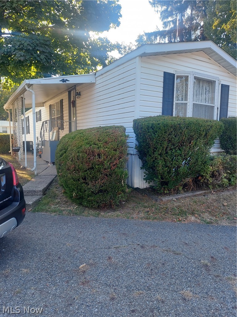 Well maintaned Mobile home.  Located in a quite well established 55 plus community.  Large living room with build in cabinets.
 Large Kitchen with eating area. All applianced kitchen. 2 bedrooms each with full baths. Laundry room . Washer and dryer stay. New roof and gutters. 2 New skylights with remotes open and close shades.  Lot rent $590.00 per month includes water, sewer and trash removal.  As Is.