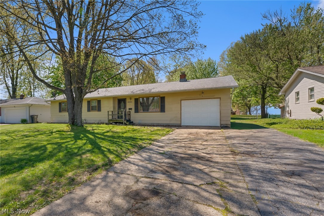 Welcome home to this inviting 4-bedroom ranch, where comfort and easy living come together beautifully. From the moment you walk in, you’ll love eat-in kitchen—perfect for morning coffee, casual dinners, and gathering with family and friends. Just off the kitchen, the cozy living room offers a welcoming space to relax and unwind at the end of the day. The primary bedroom features its own private half bath, while three additional bedrooms and a full bath provide plenty of space for family, guests, or even a home office. Step outside to the back deck—an ideal spot for summer evenings, grilling, or simply enjoying a quiet moment outdoors. And if you need space for vehicles, hobbies, or storage, you’ll appreciate the rare combination of a detached 3-car garage plus an attached 1-car garage. This home is all about comfort, convenience, and creating everyday moments you’ll love. Come see it for yourself!