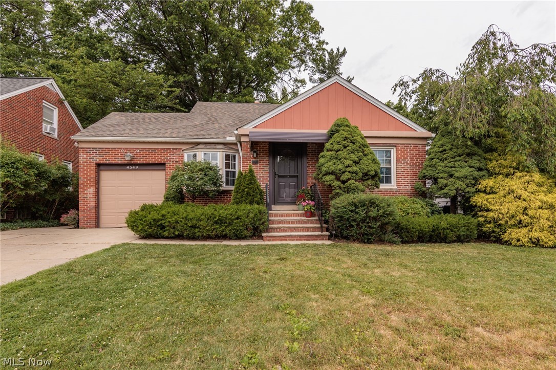 You will love this open and spacious Cape Cod/Bungalow conveniently located in South Euclid, just minutes from the library, shopping, parks, and everyday amenities. This well-maintained home offers multiple gathering spaces, including a formal living room featuring beautiful mid-century cove molding and hardwood floors that extend throughout much of the home. The expansive great room and dining area overlook the large park-like backyard, creating the perfect setting for entertaining or relaxing. Enjoy the convenience of first-floor living with three bedrooms on the main level. Upstairs, the charming primary suite provides a private retreat with abundant closet space and room to create a sitting area, office, or reading nook.The finished lower level offers exceptional flexibility with additional family or recreation space, a workshop for hobbies, a large utility/storage room, and a full bath featuring an upscale custom tile shower. The kitchen is designed for both function and style with full-overlay cabinetry, granite countertops, abundant storage, and included appliances, most of which are newer. Major mechanical updates provide peace of mind, including the roof, furnace, and hot water tank—all replaced within the last five years. Outside, you'll find a charming shed that can serve as a gardening retreat, playhouse, or creative workspace, along with a patio and porch ideal for grilling and outdoor gatherings. A home warranty is included for added confidence. An exceptional value offering space, updates, and flexibility in a convenient South Euclid location!