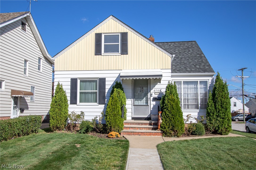 This meticulously maintained bungalow is the perfect place to put your finishing touches! It features an updated kitchen that's open to the dining room with a stone accent wall. In the large living room you'll notice the abundance of natural light, neutral paint, and coved ceilings. Also on the first floor are two good-sized bedrooms and a bathroom with charming honeycomb tile floors (it's back in style!). And even better, there's hardwood underneath the carpet - you could bring back the original charm! Upstairs is a huge third bedroom with tons of storage. The basement features a large finished rec room. Outside, the yard is nicely fenced and the 2 car detached garage has a covered patio area perfect for entertaining or relaxing. The big ticket items are all newer, including the roof, furnace (2007), hot water tank (2004), electrical, and many windows have been replaced throughout the home. Located just off Ridge Rd, just a block from some great food, and minutes to I-480 and the Shop