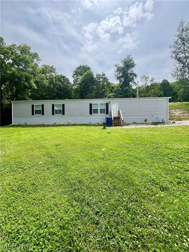 One level living home ready for a new owner! Situated on almost an acre of beautiful rolling land. Large yard w/ some mature trees just waiting for that fire pit, camp chairs & tire swing! Room for all of the outdoor activities you love! A new large yard barn great for all your tools, mower & lots of extra storage space! This great addition to the property is approx. 14x20! 3 bedrooms, 2 full baths, open concept living rm, kitchen & dining area is right off of the laundry room! The primary suite w/private en-suite is spacious & an area for true relaxation! You will not find a more peaceful setting on a dead-end road but still less than 1 mile from Rolling Hills Campus. This home is clean and move in ready! Set up your private showing today.
