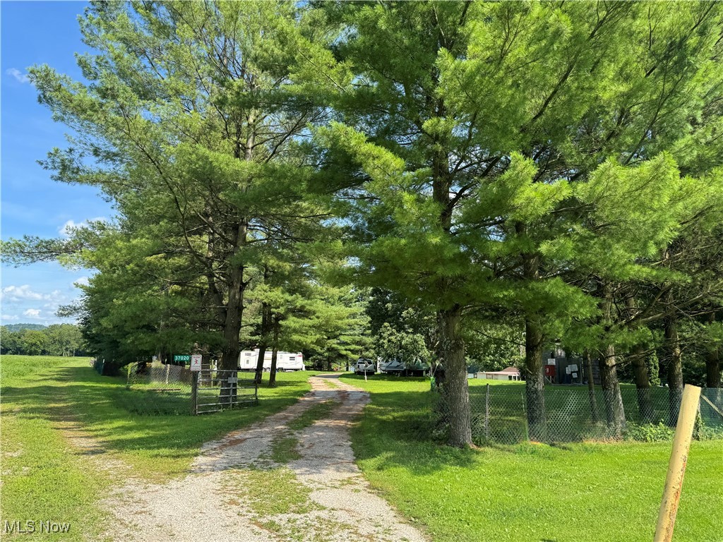 This campground is absolutely beautiful!  It is located in Sardis, OH, along the beautiful Ohio River, surrounded by trees, boat ramp, pavilion with picnic tables, dump station (multiple septic tanks), public sewage coming soon, water, electricity, fenced in area with gate, security light, 10 campsites with hookups.  You are just minutes away from the post office, tire shop, dairy bar, restaurant, churches, and more!  This is in a highly sought after area, which should go fast!