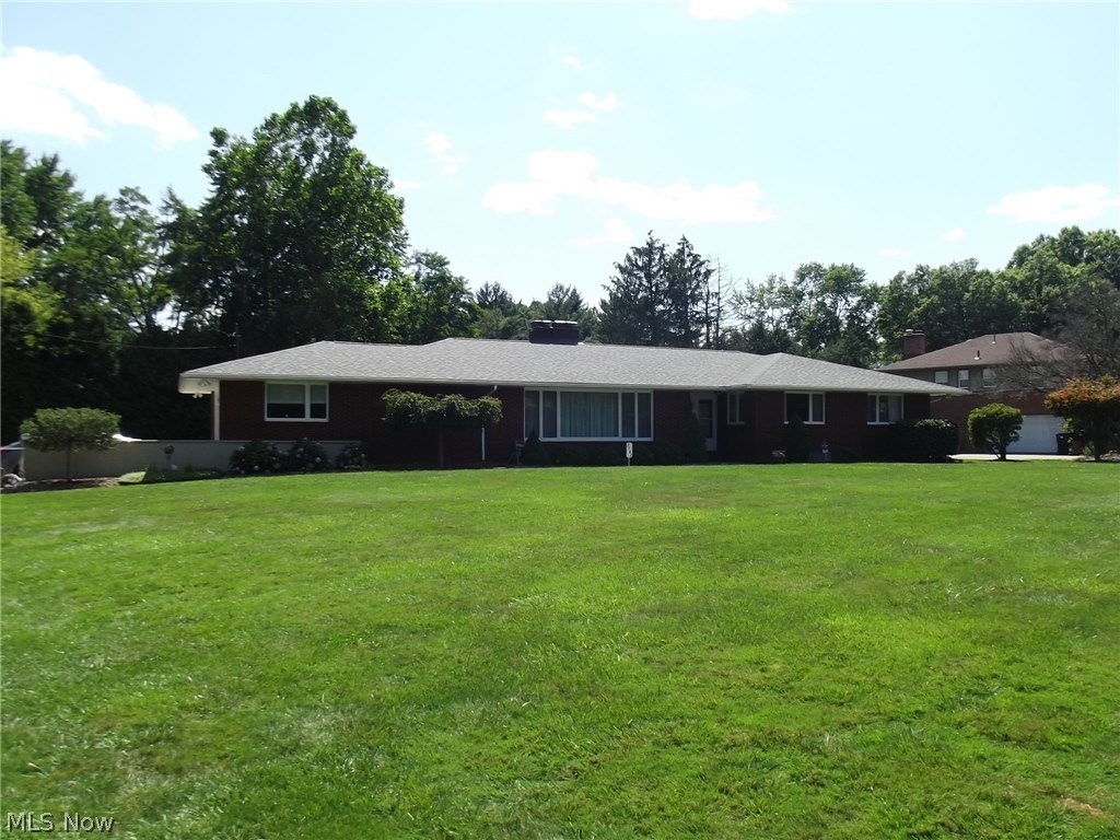 Super sharp well cared for all brick ranch on large corner lot. The home features 3 spacious bedrooms, 2 full baths, large eat-in kitchen with all appliances, woodburning stone fireplace in living room, gas fireplace in basement and 2 car attached garage. Additional features are finished basement, private covered back patio, roof 2016, central air 2012, blown in insulation in attic and all window treatments stay. This home is in mint condition and it shows!! Home Security System.