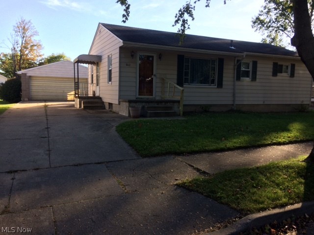 Move in ready ranch!!  Large open living room, dining area and kitchen with range, refrigerator and dishwasher.  Sliders in the dining room take you out to the large fenced in back yard.  The 3 bedrooms and full bathroom are all on the main floor.  There is a finished rec room/ man cave/ office and half bathroom in the basement.  Tons more space and potential in the basement too!  Newer hot water tank, shower in the corner, updated electrical and the dryer stays.  The wide paved drive leads to the hidden bonus of the property, a 4 car garage!  If you work on cars, have recreational vehicles or need lots of extra storage, you will fall in love with this property!