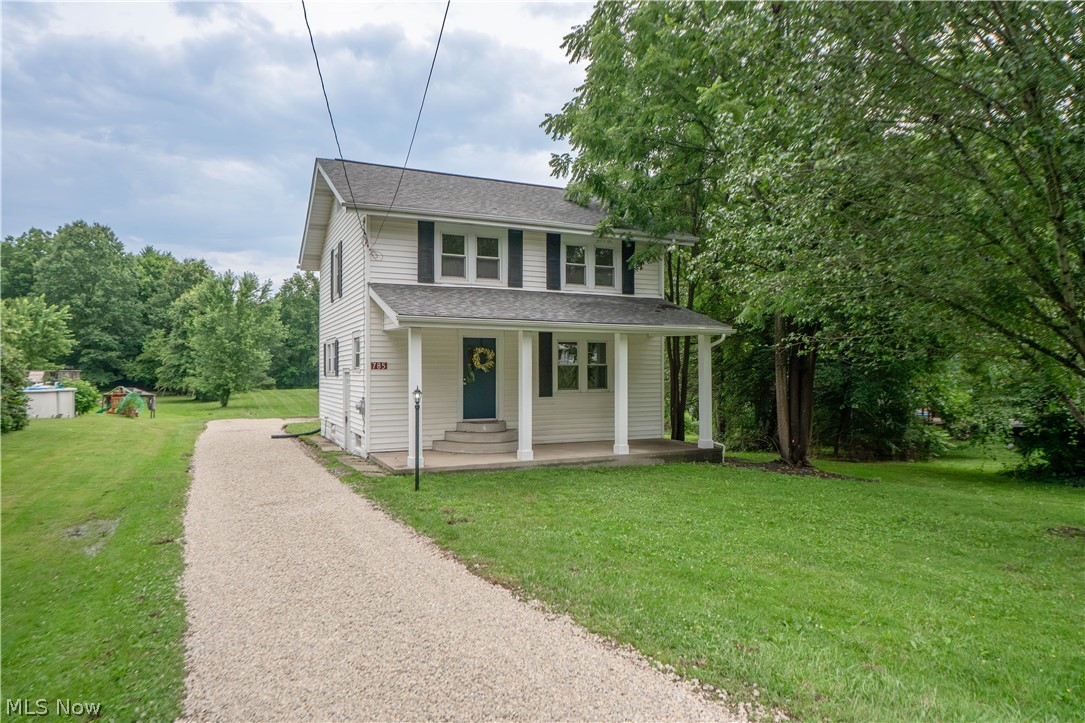 Updated and move-in ready, this charming Colonial offers 3 bedrooms, 1 full bath and a large .95-acre lot on a dead-end street. A welcoming covered front porch leads inside to a spacious living room featuring refinished hardwood floors, fresh paint, updated fixtures, and great natural light. A curved archway opens to the formal dining room, creating an easy flow for everyday living and entertaining, with sliding doors leading to the new back deck.

The kitchen has been beautifully refreshed with new cabinetry, LVT flooring, granite countertops, tile backsplash, stainless steel appliances, new sink and faucet, and a convenient coffee bar. Upstairs, you’ll find three comfortable bedrooms with new carpet, along with an updated full bathroom featuring a dual-sink vanity and tub/shower combination. 

The lower level adds a finished recreation room, perfect for a second living area, office, workout space, or playroom, plus washer dryer hookups and additional storage. Outside, enjoy the new deck overlooking the large lot with plenty of room to relax, garden, or entertain. A gravel driveway leads to the large detached 2-car garage with a new roof. Additional updates include new plumbing throughout, new paint, fixtures, carpet, refinished hardwood floors, new hot water tank, and central air. A wonderful blend of classic charm, fresh updates, and outdoor space!