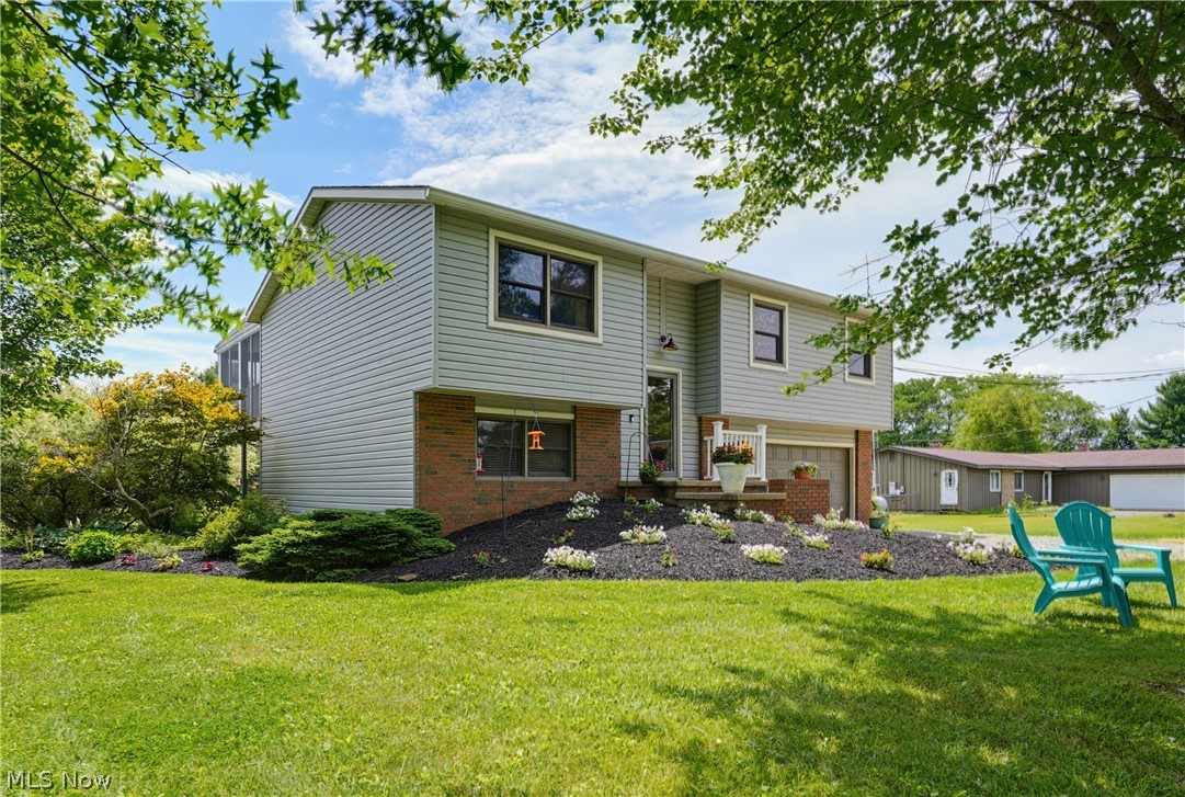 Welcome to 12904 Butler Road, where peaceful country living meets modern luxury. Nestled on 1.5 beautiful acres, this custom-built bi-level has been completely renovated from top to bottom, offering the perfect blend of style, comfort, and functionality. Every detail has been thoughtfully updated, creating a truly move-in-ready home that feels like new.

Step inside to a bright, open-concept floor plan filled with natural light, making everyday living and entertaining effortless. The stunning chef-inspired kitchen is the heart of the home, featuring abundant cabinetry, exceptional storage, modern finishes, and a full suite of brand-new appliances that remain with the property.

The main level offers three spacious bedrooms and a beautifully renovated full bath. The fully finished lower level provides exceptional additional living space with a large family room, a custom built-in office perfect for working from home, an updated three-piece bath, laundry area, and direct access to the oversized two-car garage.

Designed for indoor and outdoor enjoyment, French doors from the dining room lead to a charming screened-in deck—ideal for morning coffee, evening relaxation, and bug-free summer nights. Sliding glass doors from the lower level open to a covered patio, creating another private space to enjoy the peaceful surroundings.

The 1.5-acre setting offers privacy while remaining just minutes from shopping, dining, and everyday conveniences. Two outbuildings provide ample storage and flexibility for hobbies, equipment, or recreational vehicles.

For added peace of mind, the seller is including a comprehensive one-year home warranty, making this exceptional property truly worry-free.

Properties offering this level of renovation, privacy, and acreage are increasingly difficult to find. If you've been searching for a home that combines modern updates with the tranquility of country living, 12904 Butler Road is the one you've been waiting for.