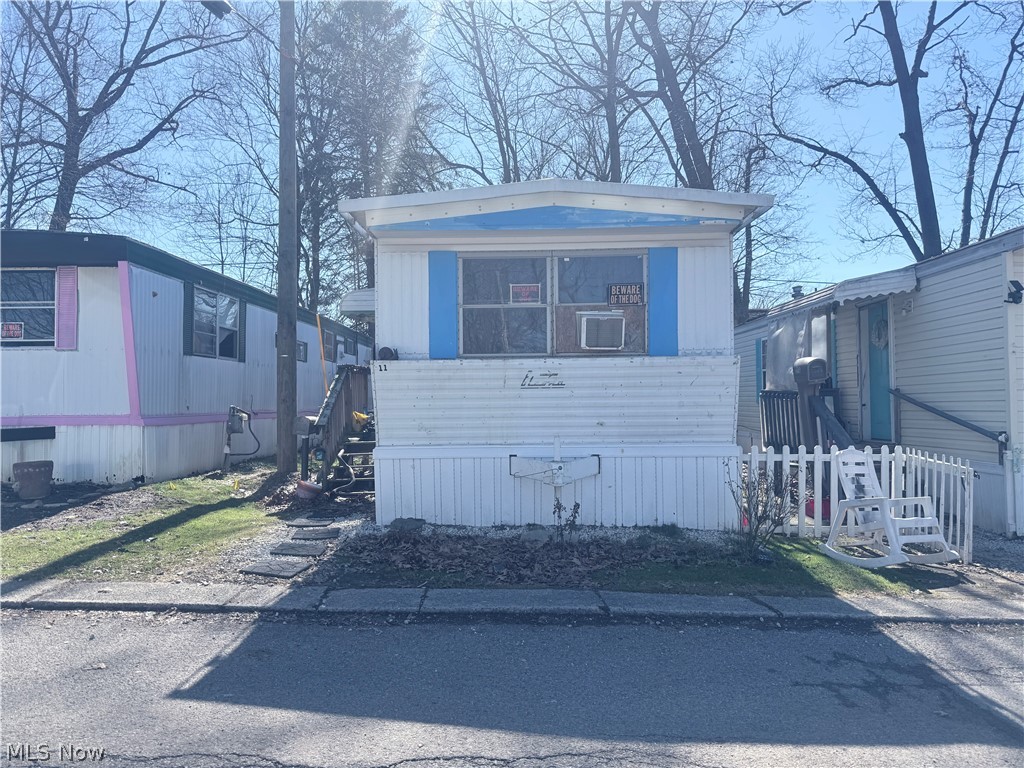 This 3-bedroom, 2 full bath mobile home offers a great opportunity to add your personal touches and make it your own. The home features a functional layout with a comfortable living area and an eat-in kitchen, along with the convenience of an in-home washer and dryer. The primary bedroom includes a private full bath, while two additional bedrooms provide flexible space for guests, hobbies, or a home office. With a little TLC, this property has great potential. Conveniently located close to shopping, dining, and major highways, making commuting and everyday errands easy. A great opportunity for those looking for affordable living or an investment possibility.