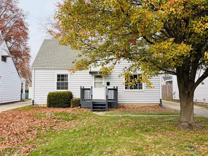 This charming 4-bedroom bungalow/cape cod offers a perfect blend of comfort, style, and convenience. The property boasts a nice-sized fenced-in back yard, ideal for outdoor activities and relaxation and very young roof ensures peace of mind and durability for years to come! The home also features a spacious, detached one-car garage as well. Inside, the bright living area is flooded with natural light, creating a warm and inviting atmosphere. Fresh paint throughout enhances the clean, modern feel, with new vinyl flooring & new carpet. The kitchen is thoughtfully updated with brand new cabinets, a granite countertop and durable lvp flooring, making it a delightful space for cooking and entertaining. On the main level, you’ll find two generously sized bedrooms adjacent to a fully updated bathroom, combining comfort and functionality. Upstairs, you will find two bedrooms and/or an office.  Last, the home has vinyl windows, newer roof, younger hot water tank, updated electrical, new kitchen, fresh paint, new flooring & a partially fenced-in yard.