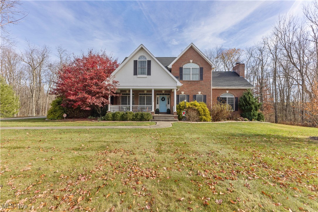 NEW PRICE! Motivated seller says SELL!
 Step into luxury with this beautiful 4 bedroom, 4.5 bath, all brick masterpiece, perfectly situated on a sprawling 2-acre lot offering both space and tranquility. Built in 2000, this home boasts an inviting open floor plan that radiates warmth and comfort, ideal for families and entertaining alike. As you step inside, you will be greeted by a bright and spacious entry accentuated by beautiful hardwood flooring throughout the first floor of the home. The heart of the home features a large, eat-in kitchen with an abundance of cabinetry that any chef would adore, complete with stainless appliances, quartz countertop, and an expansive island perfect for entertaining. The formal dining room is perfect for those special occasions to host gatherings with family and friends. The breathtaking family room features a stunning wood burning fireplace and space to create memories with loved ones. The bright sunroom is filled with natural light where you’ll enjoy views of your tranquil surroundings offering a perfect spot for morning coffee or afternoon reading. The owner's suite is a true retreat, boasting his and hers walk in closets and a luxurious bathroom with dual vanities providing a serene escape from a long day. The upper-level houses three additional spacious bedrooms and two more well-appointed full bathrooms, perfect for family or guests. The fully finished lower level is a true gem offering plenty of versatile space with a cozy gas fireplace, kitchenette area, full bath and an unreal amount of storage to stay organized ensuring everything has a place. Recent updates include a new roof and a dual zone HVAC system, providing peace of mind and energy efficiency. Plus, a Generac generator safeguarding that you will never be left in the dark. An easy commute with an approximate 30-minute drive to 4 hospitals, beautiful Oglebay Park and an only 45-minute drive to the Pittsburgh International Airport! $625,000