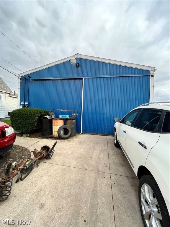 The building is a metal structure that is divided into two units.  The back is being used by the owner for personal use.  The front unit has a month to month tenant that is using the front space for auto repair.  There is an office and a restroom facility in the front unit.  There is no office space or restroom in the back space.  Both units are heated by a forced air industrial heating system, each unit has its own heat source.  There is a lift, and a snap on compressor that will remain in the front unit.
