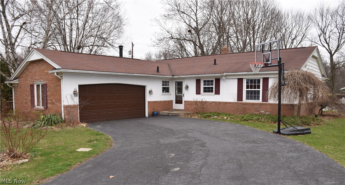 Gorgeous corner lot ranch in Plain Township!  Eat-in kitchen with lots of cabinets and all appliances included.  Off of the kitchen is a family room or formal dining room.  Then a set of four French doors open up into the spacious sunroom.  Beautiful hardwood floors run from the entry, through the living room, hall and all bedrooms.  Open living room has tons of natural light from the huge picture window.  All bedrooms have large closets and ceiling fans.  Master bedroom has an it's own half bath!  A BRAND NEW WATERPROOFING system has just been installed!  This comes with a transferrable warranty as well.  There's plenty of parking with the paved drive and two car attached garage.  Beautiful landscaping surrounds the house and there's great entertaining space in the back with a small deck, patio, fire pit and koi pond.  There is also a shed with a fenced in dog run.  This home has a central vacuum and reverse osmosis system too.  Homes like this one are in demand.  Don't hesitate, call