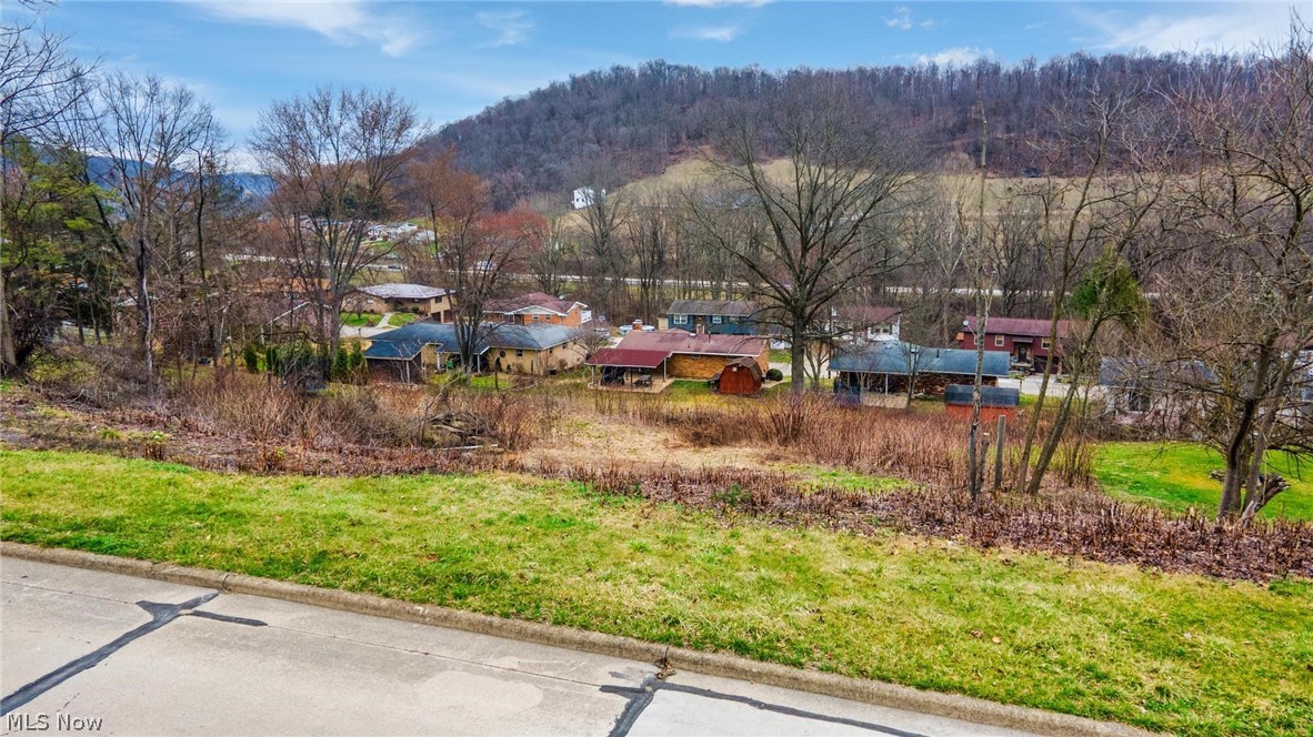 HALF AN ACRE TO BUILD WITH POSS. CITY CONVENIENCES! Build your dream home in a desirable suburban setting! These beautiful residential lots offer the perfect opportunity to create the home you’ve always envisioned while enjoying the comfort and convenience of a well-established neighborhood. Located just minutes from the highway, these parcels provide easy access for commuters while still offering the peace and quiet of suburban living. This location offers ample space for new construction, with utilities nearby and plenty of room for outdoor living, landscaping, or future additions. Enjoy the best of both worlds—quick access to shopping, dining, schools, and everyday amenities while returning home to a relaxing residential environment. Whether you're a builder, investor, or future homeowner, these lots present an excellent opportunity to secure land in a growing area with convenient highway access and endless potential. Under 40 min to Pgh Airport, minute or two from Timet Metals, and less than 15 minutes to FUS! Call today!