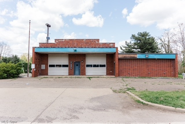 Spacious former fire station full of potential! This unique property offers abundance of open space, ample parking and endless possibilities. Perfect for car enthusiast's dream garage, man cave, workshop, storage facility, body shop or small business use.  Features garage bays, heigh ceilings, and plenty of room for equipment, vehicles, hobbies or projects. Rare opportunity to own a one-of-a-kind property with flexible potential and tons of usable space.