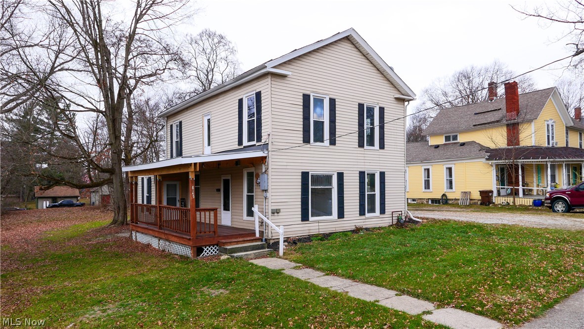 Welcome to this beautifully updated home in the heart of Garrettsville, where classic character meets modern convenience. Situated just minutes from downtown shops, restaurants, parks, and schools, this move-in-ready property offers the best of in-town living while featuring an unexpectedly large, private backyard perfect for entertaining, gardening, or simply relaxing. Inside, natural light pours through oversized windows, highlighting the home's refinished hardwood floors and original woodwork that add warmth and timeless appeal. A handicap-accessible mother-in-law suite provides endless flexibility as a guest suite, private living quarters, home office, or bonus living space. The main floor also features the convenience of first-floor laundry. Major improvements provide peace of mind, including updated electrical and plumbing, a new water line from the street, new hot water tank, restored front porch and porch roof, efficient gas wall heaters, two beautifully remodeled bathrooms, plus fresh paint and new carpet upstairs. Blending historic charm with thoughtful updates, this unique Garrettsville home is ready for its next owner. Schedule your private showing today!
