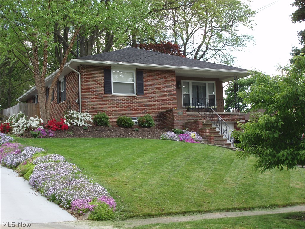 WOW!!! Very nice raised ranch.  Lower level with hand crafted bar and built-in wine rack in Rec.Room, 3 bedroom and full bath with walk in shower. Laundry room with built-in cabinets and desk area.  Main floor has 2 large bedrooms with hardwood floors and full bath with soaker tub. Gas log Fireplace in the Living room.  Fenced in backyard with patio