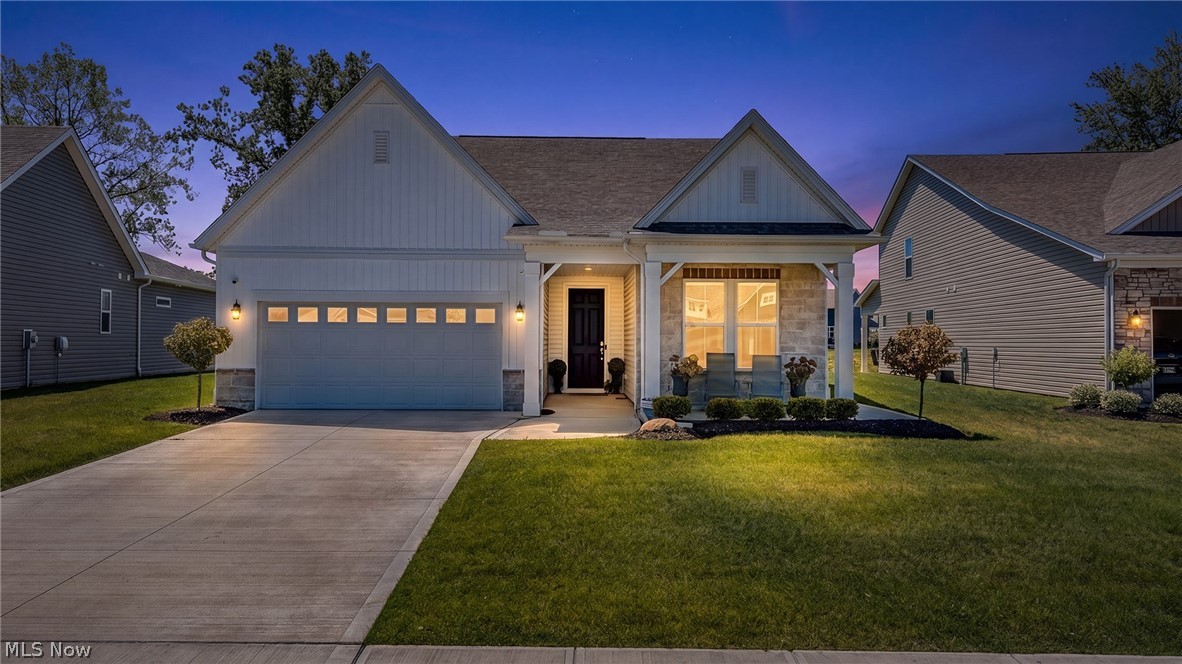 Why wait to build when you can move right into this stunning, better-than-new home completed in 2024? Thoughtfully designed with premium upgrades and custom finishes throughout, this 3-bedroom, 3.5-bath Cape Cod also offers a versatile bonus space that can easily serve as a fourth bedroom, home office, or additional living area.

Step inside to an open-concept floor plan that seamlessly connects the living room, dining area, and show-stopping kitchen. Featuring crisp white cabinetry, upgraded quartz countertops, high-end stainless steel appliances, designer lighting, and a rare chef's scullery, or "messy kitchen," that keeps prep, cleanup, and small appliances tucked away while the main kitchen remains picture-perfect, this home was built for both everyday living and effortless entertaining.

The main level features a private guest suite with a full bath, a convenient powder room, first-floor laundry, and a luxurious primary retreat complete with a spa-inspired bath featuring a stunning custom tile shower, dual quartz vanities, and two custom walk-in closets.

Upstairs you'll find a spacious third bedroom with a full bath, along with a flexible bonus room ideal as a fourth bedroom, office, media room, or additional living space.

No detail was overlooked, from upgraded lighting and plumbing fixtures to automated blinds, custom closet systems, premium flooring, and thoughtfully selected designer finishes that create a sophisticated, move-in-ready home.

Step outside to a beautifully landscaped backyard featuring a brand-new stamped concrete patio overlooking a peaceful stream and walking path, creating the perfect setting to relax or entertain. An irrigation system is already installed to keep the landscaping looking its best. A security system gives extra peace of mind. 

Conveniently located near shopping, dining, and freeway access, this exceptional home offers all the benefits of new construction without the wait. Simply unpack and enjoy.