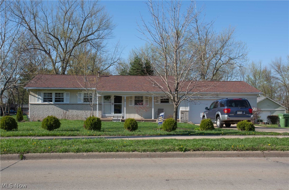 Great Ranch with one and a half bath in Tallmadge. 2 Car attached garage. Full basement - half finished. Huge rear yard and a deck overlooking open spaces. Hard wood floors. Very nice kitchen with newer appliance that remain. Ceiling fans in bedrooms & living room. Super buy for the money!