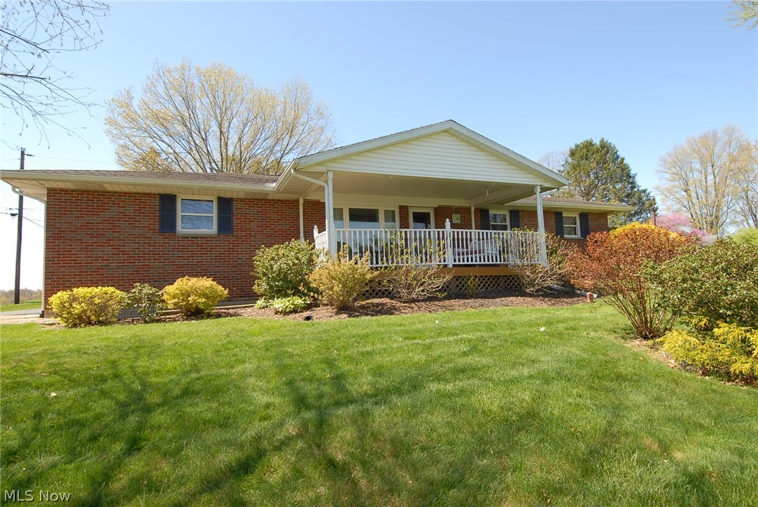 Spectacular property featuring an immaculate 3 bedroom, 2.5 bath brick ranch home, lots of updates. bar in kitchen, recessed lights, granite countertops, fully applianced, hardwood floor in living room, cozy TV room with sliding glass door. Full basement with family room, kitchen, bath and bedroom, could be a mother-in-law suite. Covered front porch, pergola on back entrance. An extra lot features a detached garage with separate driveway and a covered front porch. Furnace in garage is not warranted. Beautifully manicured landscaping with lots of flowering plants and bushes. An enticing pergola in back yard to enjoy. Close to St Rt 16 and Granville/New Albany. 15 minutes to Zanesville. Minutes to Dillon Lake for boating, swimming, fishing and camping.Agent related to sellers