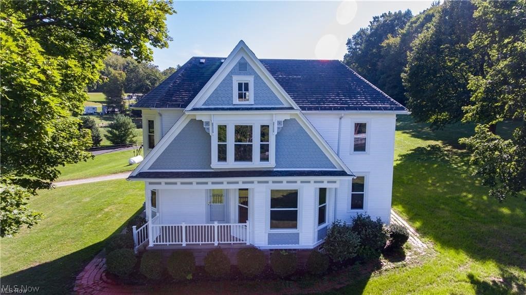Ready for a brand new home that you don't have to wait on? Or have you finally found that Bed & Breakfast you have been wanting to open? With the prices to build right now, this home has all of the updates to make it brand new AND all of the character that you can’t get with a new build. The current owners have been in the area their whole lives and would love to see this home with someone loving it again.  Close to a local park that has a heated pool, splash park, hiking, best 4th of July fireworks for miles, and more. It is such a great, family friendly park that the Sellers are offering to pay for the first year of membership for whoever chooses to make this their home! From the kitchen cupboards trimmed in walnut, to the irreplaceable chestnut trim throughout the home, all woodwork is original. There is a bedroom on the main level and three on the second level, full basement, 3 car garage, and more! There are too many things to list about the updates but I will try...all new carpet