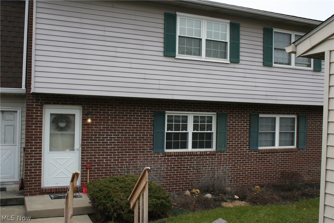 This spacious condo features a first floor half bath, a large living room with a cozy stone fireplace and a slider going out to a deck that overlooks a wooded area. The kitchen has all appliances and an eating area that has plenty of room for a full size table.  The master bedroom is roomy with ample closet space. With a large walkout basement, the options are open. Some added benefits are, a reverse osmosis system for the water, front windows, front door and screen have all been updated, the furnace and air conditioner were both replaced in 2003, and a security system is installed.  Washer and dryer are staying with condo.