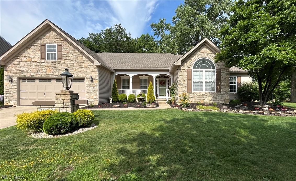 Absolutely lovely 3BR/3Bath ranch home has ideal location within Vermilion’s much sought after Indian Ridge! Gorgeous stone façade and quaint front porch lead into this move-in ready ranch home situated on a private lot overlooking an incredible pond. Expansive layout offers everything you are looking for including:  large open kitchen w/granite countertops/massive island/breakfast bar/stainless steel appliances/custom tile backsplash/loads of cabinets/counterspace. A true chef’s/entertainer’s dream! Kitchen opens to large family room with attractive gas fireplace and a wonderful morning room. Floor to ceiling windows overlook your partially wooded backyard and pond. Fantastic owner’s suite boasts large walk-in closet, wonderful natural light, tray ceiling, and master bath w/double vanities, ample storage, and a walk-in tile shower w/spa water jets. 2 additional nice-sized bedrooms on main level also feature pleasing natural light. Foyer opens to a bonus room for dining, living room, office, craft space etc. Main level laundry. Partial finished basement has plenty of room offering extra living area and nice sized 1/2 bath! Basement has additional large storage area as well. Truly wonderful yard includes newly constructed deck/brick patio and built-in firepit. New shingles in 2025. Newer gutter guards/hot water tank. Fantastic development, which includes membership access to clubhouse, indoor pool, tennis and basketball courts. Short drive to Downtown Vermilion, highway access, and metroparks.