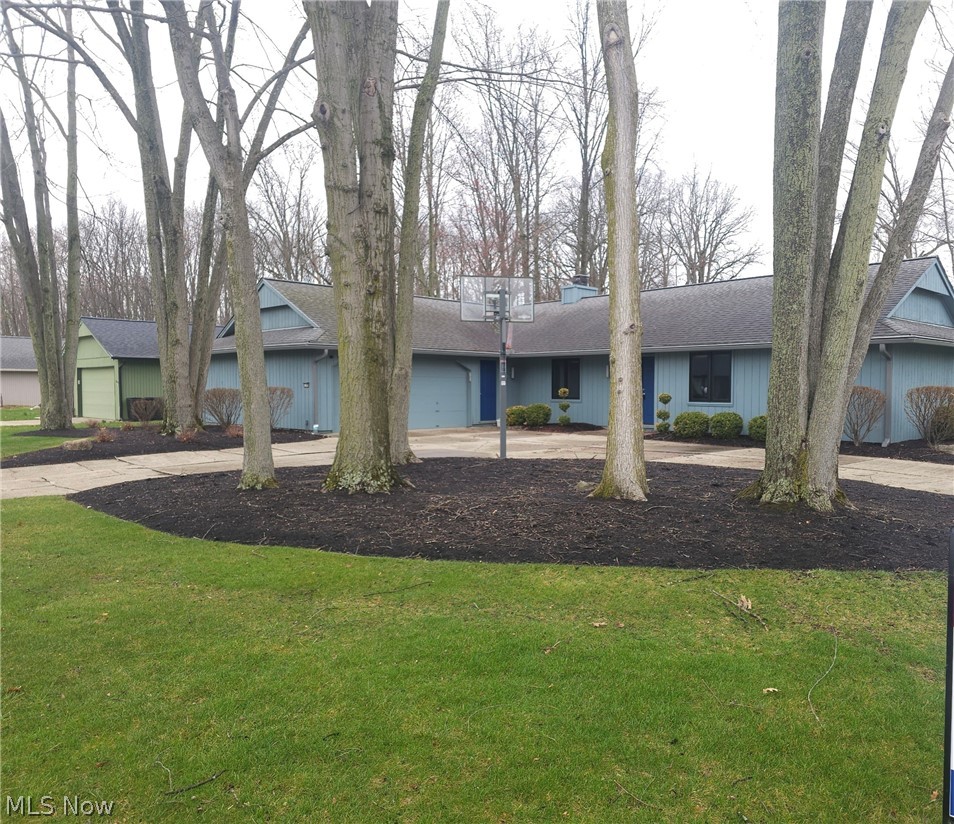 Very Spacious Ranch in Meadowood. Close to all Strongsville has to offer.2289 sq ft 4 BR 2.5 Ba ranch home features just replaced $45k worth of Andersen Architect Series casement windows. Recently painted exterior, recently replaced fence for privacy at the large patio, and re-landscaped.  Kitchen has granite counters, stainless appliances, brand new washer. Freshly painted Living Room Dining Room. Cabinets with granite counters offer great buffet service for dining room. Beautiful open plan with 2 generous living spaces. Woodburning fireplace in Family room. FR also features built in cabinets/bookshelves. MBR has WIC. 3 additional bedrooms round out the generous living space. VERY LARGE 2+CAR GARAGE with 220 line for Electric Car charging already installed. Circular drive. Recreation community offers tennis, pool, playground as part of the association. Exterior Blink cameras. stay.