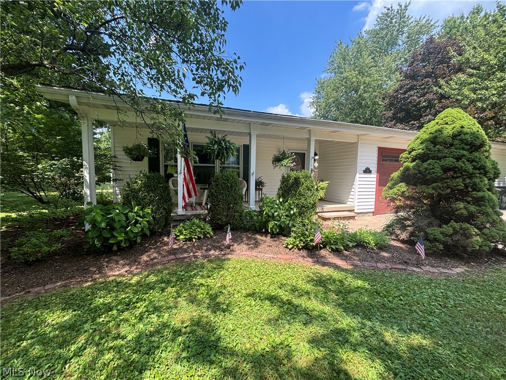 This stunning home in Aurora is a must see! On a double lot with over 2 acres. This 4 bedroom, 4 bath home with a lower level bonus suite/office is a must see! Just a few features include large main living room with a fireplace that is gas but can be converted to wood. The first floor master suite with built in floor to ceiling custom closets and a large glass and tile shower with a garden tub is sure to help you forget about that stressful day at the office.  The living area has a large galley style kitchen with beautiful custom oak cabinets, quartz countertops, breakfast bar, and dining room that flows into the family room. Great for entertaining. The family room opens up to your own private garden area with a pond. But wait there's more!  If you like to entertain or just hide away from the rest of the world the outdoor bar area (24 X 18) is a must see.  The finished basement area has a fireplace, half bath, and kitchenette. The 1/2 bath could easily be converted to a full bath. Heated garage, No HOA fee's. The additional lot is buildable with access to city water and sewer. This one won't last. Be sure to schedule a private tour with your favorite Realtor today.