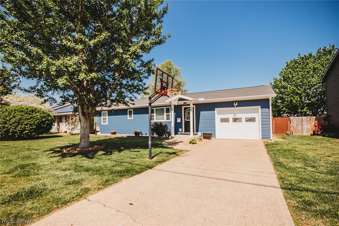 Beautifully updated 3-bedroom, 2.5 bath home located in Belpre! This move-in ready property features an open-concept layout with a spacious kitchen, large island seating, and stainless steel appliances—perfect for everyday living and entertaining. The inviting living area flows seamlessly into the dining space, offering plenty of room to gather. The finished lower level provides additional flexible space ideal for a home gym, rec room, or office. Step outside to enjoy the expansive back deck overlooking a fully fenced yard—perfect for hosting, relaxing, or letting pets roam. The home also offers generously sized bedrooms, a large walk-thru master bedroom closet, updated baths, and a convenient main-level laundry area. Many big-ticket updates have already been completed, including new siding, new insulation throughout entire exterior, new windows, seamless gutters, a new HVAC system, and an upgraded 200-amp electrical service.  With great indoor and outdoor living spaces and numerous upgrades throughout, this home is one you won’t want to miss!