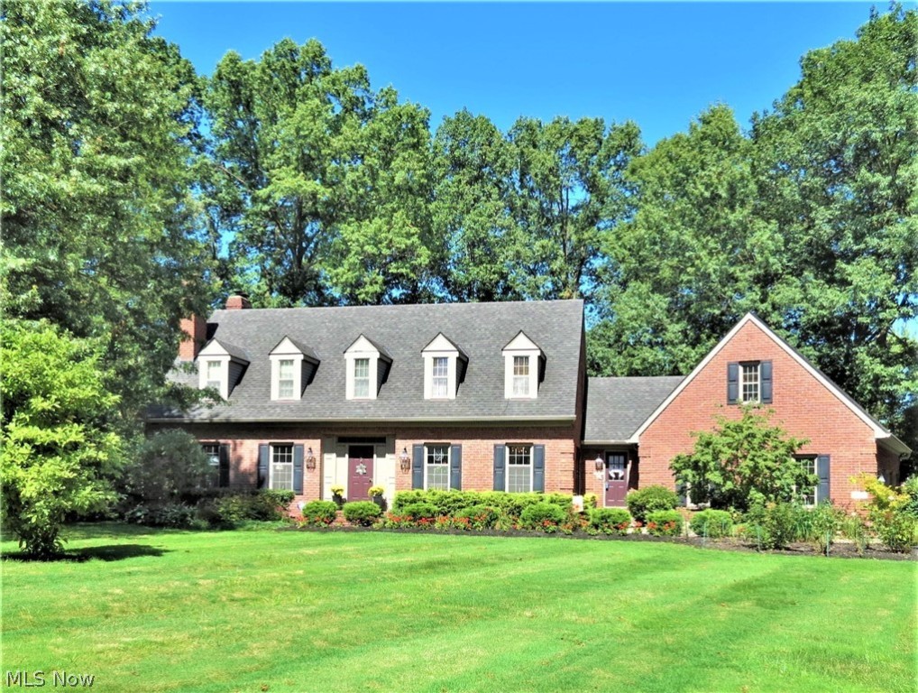 Perfectly situated on a private, 1.01 acre cul-de-sac lot in the Trumbull Country Club area w all new landscaping. This stunning custom built (1986), brick home is a reproduction of 1800s colonial. High quality upgrades & finishes inside & out (see attached list), w attention to every detail. The elegant foyer  beckons you to explore. Custom walnut hardwood floors, crown molding & trim throughout a spacious living rm w gas FP, formal dining rm w built in cabinetry, family rm w beamed ceilings, wood burning FP, wet bar, built-in cab. & French doors to the patio, all offer wonderful gathering places for enjoying. Gourmet kitchen w center island, breakfast area, cherry cabinetry, Corian counters, open colonial pantry, upgraded stainless appliances incl.dble oven. Brick floors extend through the kitchen, 1/2 bath & 1st fl. laundry. 2nd fl. features  a master suite w 2 closets, updated master bath, partially exposed brick wall adds to the charm. 2 addit. spacious bedrooms, plentiful closet space, full bath & floored walk-in attic complete this level. Basement level features a new rec room w built-ins & another full bath. 3 car att.garage. If that is not enough, views from the rear of the home overlook an inviting back yard w all brick, multi-tiered patio surrounding a gorgeous, heated inground pool (newer heater, filter, pump & light), abundant flora, lg. pool shed + 2nd storage shed, basketball court.1 year home warranty incl. Please call today for your private showing.